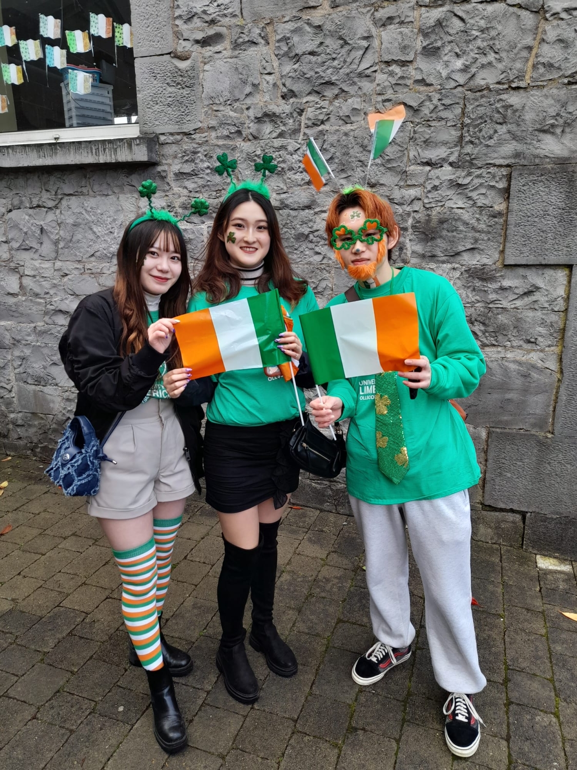 3 ULLC Students with Irish flags